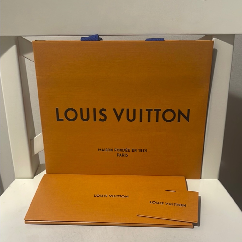 Louis Vuitton Shopping Bag, Envelope, and Tag